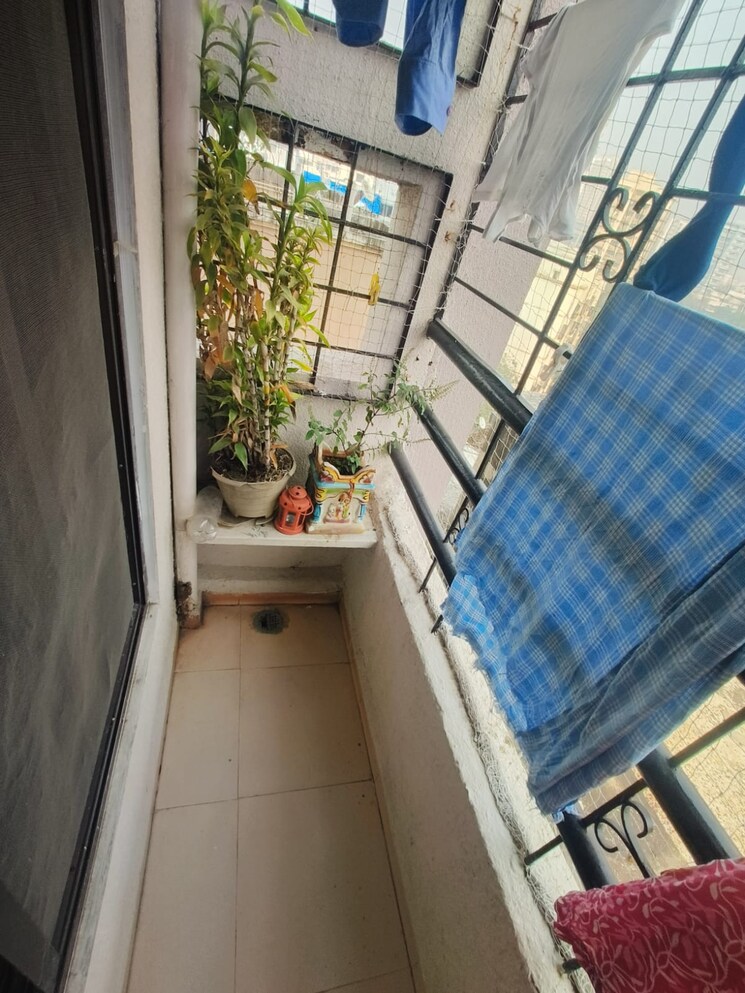Balcony, aman-spring 1 Bedroom 600 Sq.Ft. Apartment In Kandivali West Mumbai 9527507