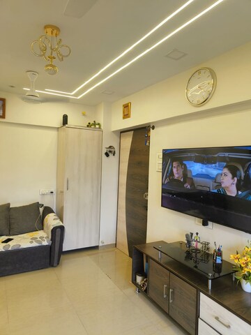 Living Room in 1 BHK Apartment at Aman Spring, Kandivali West – for Sale