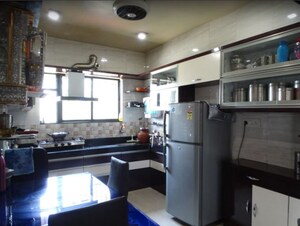 Kitchen in 2 BHK Apartment at Mahalaxmi Nagar CHS, Warje – for Sale