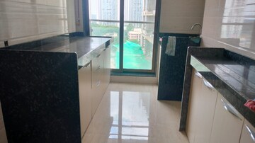 Kitchen in 3 BHK Apartment at Je And Vee Om Trimurti, Malad East – for Rent