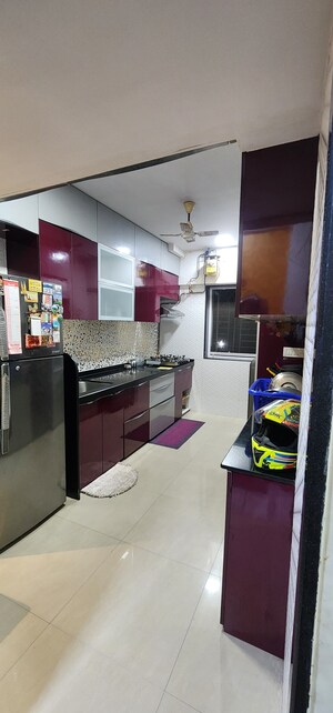 Kitchen in 1.5 BHK Apartment at Crystal Garden Estate CHS, Manpada – for Sale