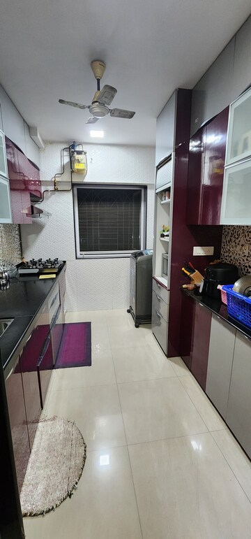 Kitchen in 1.5 BHK Apartment at Crystal Garden Estate CHS, Manpada – for Sale