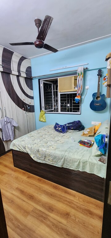 Bedroom in 1.5 BHK Apartment at Crystal Garden Estate CHS, Manpada – for Sale