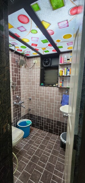 Bathroom in 1.5 BHK Apartment at Crystal Garden Estate CHS, Manpada – for Sale