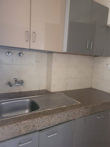 Kitchen in 2 BHK Apartment at Sikka Karnam Greens, Sector 143b – for Rent