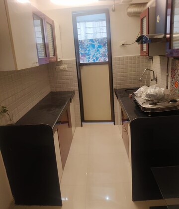 Kitchen in 2 BHK Apartment at VR Bhoomi Acres F Wing, Ghodbunder Road – for Rent