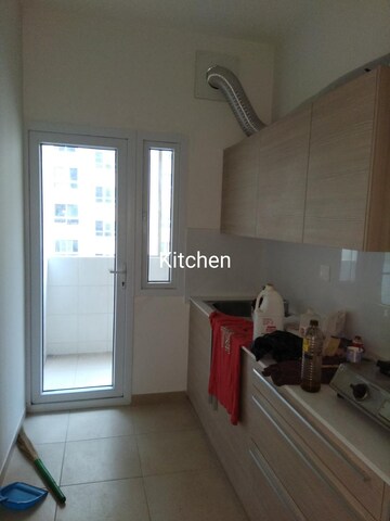 Kitchen in 2.5 BHK Apartment at Bhartiya Nikoo Homes, Thanisandra Main Road – for Rent