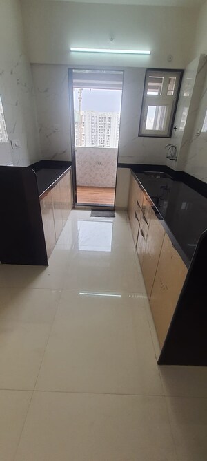 Kitchen in 3 BHK Apartment at RR Lunkad 66 Avenue, Pimple Nilakh – for Rent