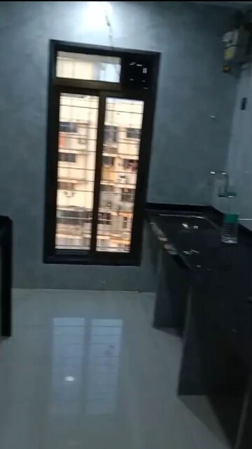 Kitchen in 2 BHK Apartment at Neelyog Towers, Malad East – for Rent