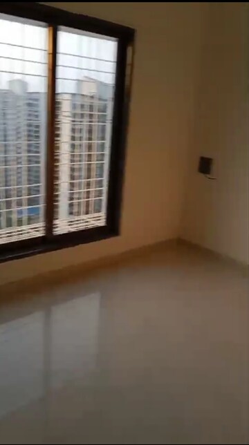 Room in 2 BHK Apartment at Neelyog Towers, Malad East – for Rent