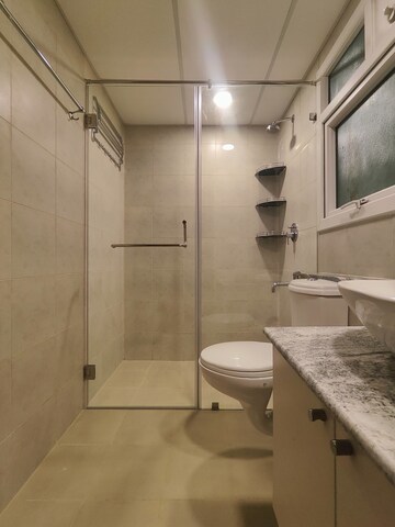 Bathroom in 2 BHK Apartment at Bhartiya Nikoo Homes Phase 2, Thanisandra Main Road – for Rent