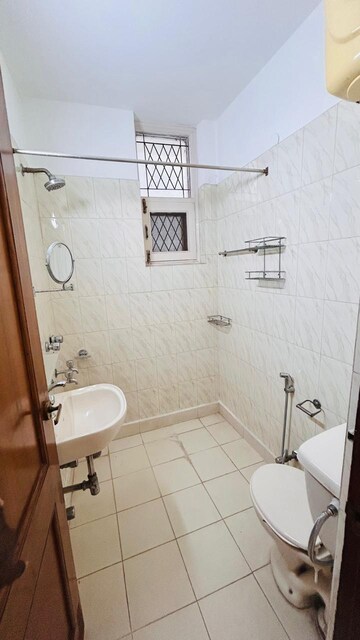 Bathroom in 3 BHK Builder Floor at Shivalik Colony – for Rent
