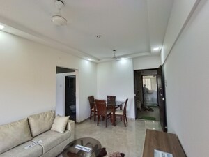 Living Room in 1 BHK Apartment at RNA Platinum City, Vasai East – for Sale