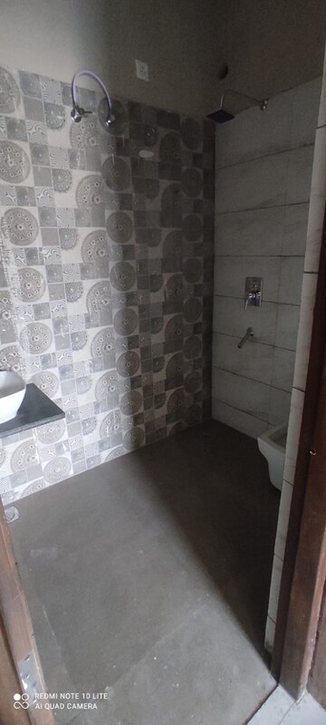Bathroom in 3 BHK Builder Floor at Guru Nanak Enclave, Dhakoli – for Sale