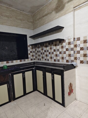 Kitchen in 1 BHK Apartment at Deepanjali CHS, Malad West – for Rent