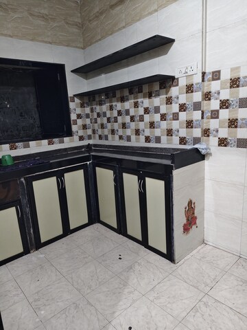 Kitchen in 1 BHK Apartment at Deepanjali CHS, Malad West – for Rent