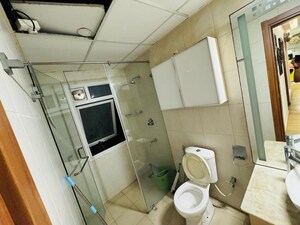 Bathroom in 3 BHK Apartment at Bhartiya Nikoo Homes, Thanisandra Main Road – for Rent