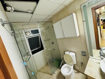 Bathroom in 3 BHK Apartment at Bhartiya Nikoo Homes, Thanisandra Main Road – for Rent