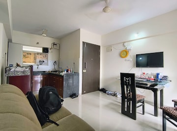 Living Room in 1 BHK Apartment at Mantra Insignia, Mundhwa – for Rent
