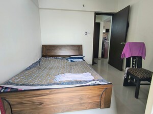 Bedroom in 1 BHK Apartment at Mantra Insignia, Mundhwa – for Rent