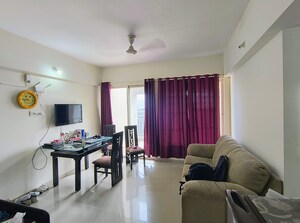 Living Room in 1 BHK Apartment at Mantra Insignia, Mundhwa – for Rent