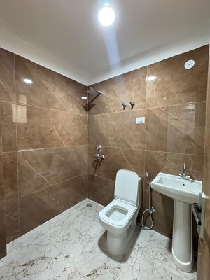 Bathroom in 3 BHK Builder Floor at Chattarpur – for Rent