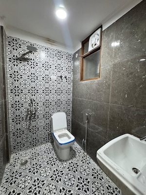 Bathroom in 3 BHK Builder Floor at Chattarpur – for Rent