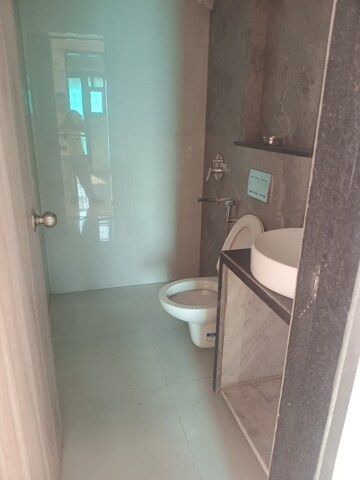 Bathroom in 1 BHK Apartment at MICL Aaradhya Highpark, Mira Road – for Rent