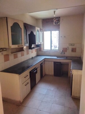 Kitchen in 3 BHK Apartment at Ashiana Palm Court, Raj Nagar Extension – for Sale