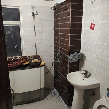 Bathroom in 2 BHK Apartment at Amrapali Zodiac, Sector 120 – for Rent