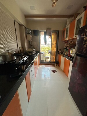 Kitchen in 2 BHK Apartment at Sadguru Paradise, Mira Road – for Sale