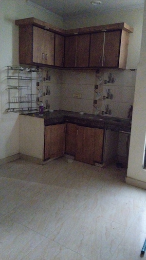 Kitchen in 1 BHK Apartment at DMD Hometech Awas Yojna, Sector 73 – for Sale
