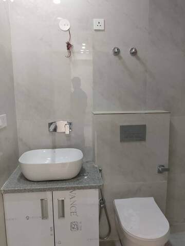 Bathroom in 3 BHK Apartment at Freedom Fighters Enclave – for Rent