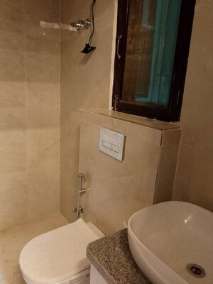 Bathroom in 3 BHK Apartment at Freedom Fighters Enclave – for Rent