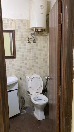 Bathroom in 3 BHK Apartment at Cosmos Express 99, Sector 99 – for Sale