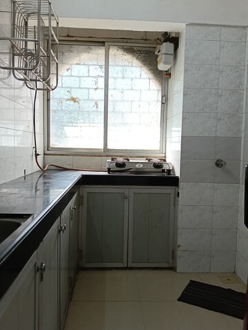 Kitchen in 1 BHK Apartment at Green Field B CHS LTD, Andheri East – for Rent