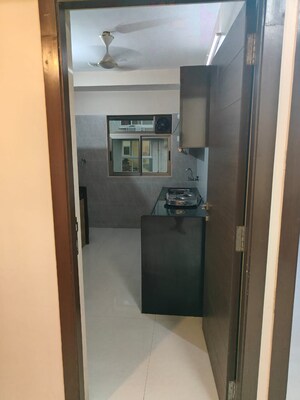 Kitchen in 2 BHK Apartment at Kabra Paradise, Andheri West – for Rent