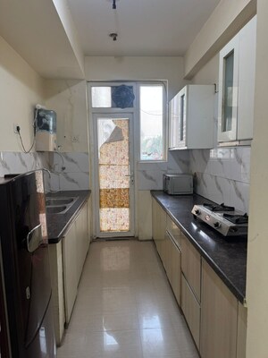 Kitchen in 2 BHK Apartment at NK Savitry Enclave, Vip Road – for Rent