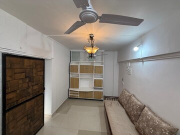 Living Room in 1 BHK Apartment at Shalom CHS, Jogeshwari West – for Rent