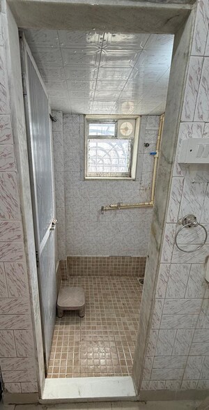 Bathroom in 1 BHK Apartment at Shalom CHS, Jogeshwari West – for Rent