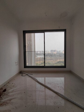 Room in 2 BHK Apartment at Sunteck City Avenue 4, Goregaon West – for Rent