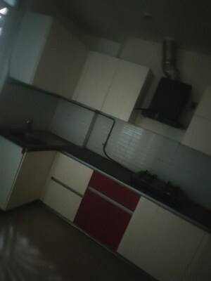 Kitchen in 4 BHK Apartment at Mahagun Mezzaria, Sector 78 – for Rent