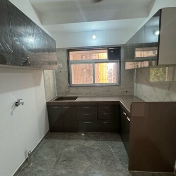 Kitchen in 1 BHK Apartment at Shraddha Evoque, Sonapur – for Rent