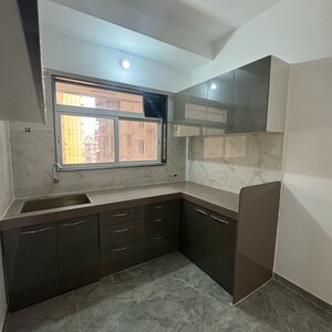 Kitchen in 1 BHK Apartment at Shraddha Evoque, Sonapur – for Rent