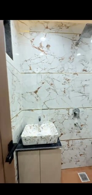 Bathroom in 4 BHK Builder Floor at Dwarka Mor – for Sale