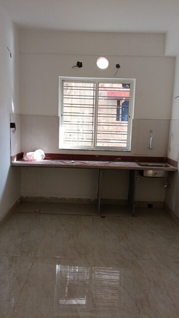 Kitchen in 2 BHK Apartment at Kristi Villa, Chinar Park – for Sale