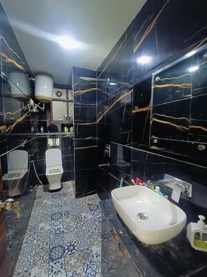 Bathroom in 2 BHK Builder Floor at Chattarpur – for Rent