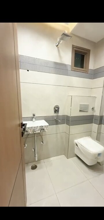 Bathroom in 3 BHK Builder Floor at Dwarka Mor – for Sale