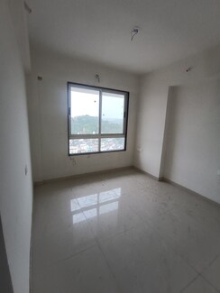 2 BHK + Pooja Room Apartment For Sale in Ajmera Crosstown One