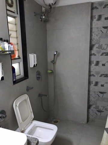 Bathroom in 1 BHK Apartment at K Raheja Heights, Malad East – for Rent